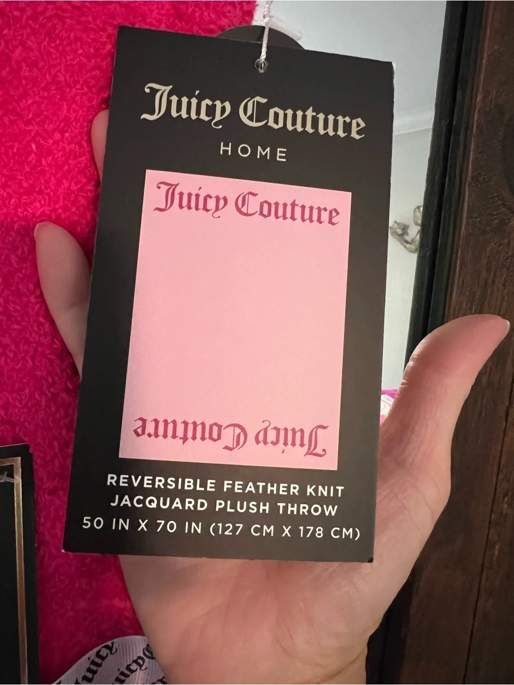 Juicy Couture Reversible Feather Knit Throw in Bright Pink with White Logo
